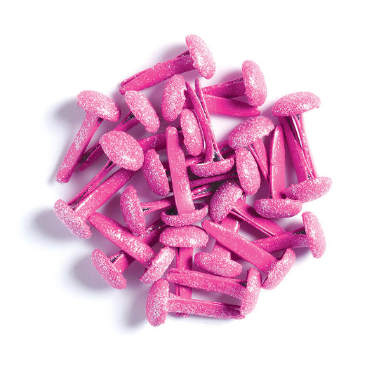 Pink glittery brads on a white background