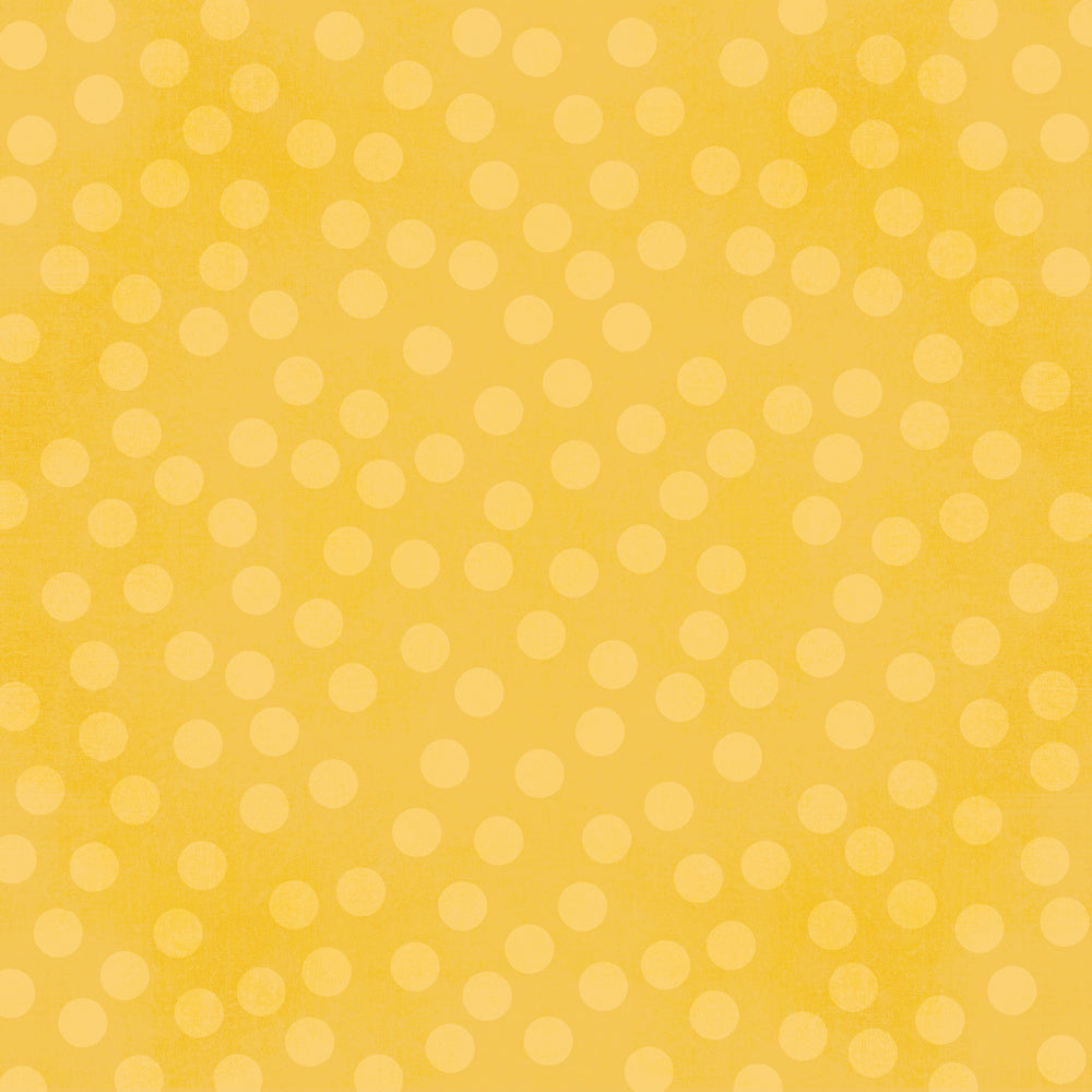 Yellow background with light yellow polka dots
