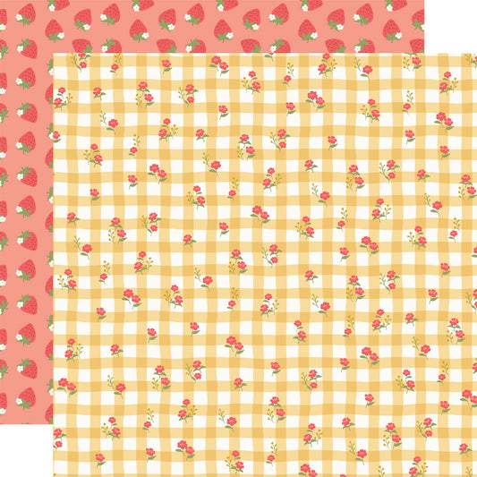 Two fabric swatches with strawberry pattern on a pink background and checkered pattern on a yellow background.