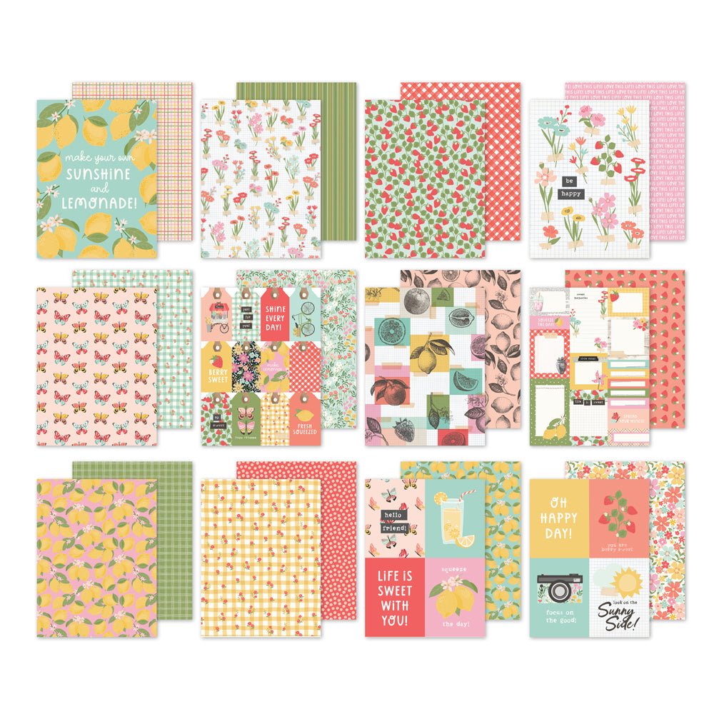 Collection of colorful 6 x 8 scrapbook paper with various patterns on a white background