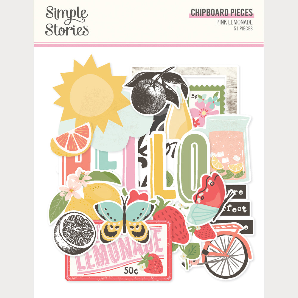 Collection of colorful chipboard pieces with decorative elements on a white background