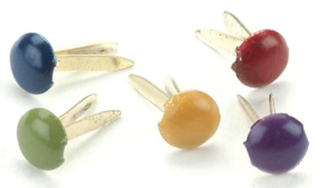 Set of colorful paper fasteners/brads on a white background