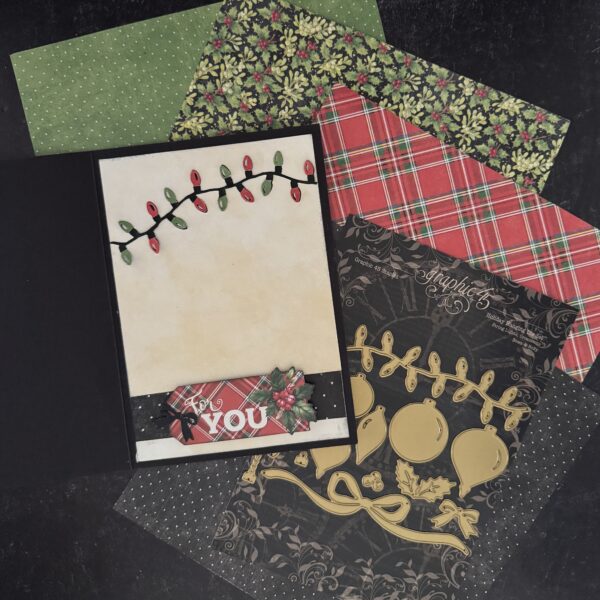 Graphic 45 - Staples Embellishments Collection - Metal Dies - Holiday Hanging Die Set - String Lights, Ornaments, Bows & Holly