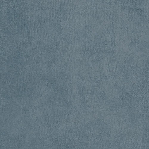 A close-up texture shot of a slate blue fabric or material surface.