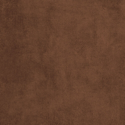 A close-up of a brown textured material, resembling suede or microfiber fabric.