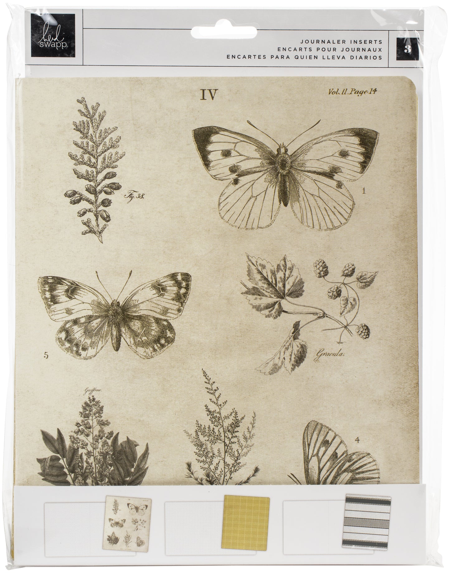 Packaging of Heidi Swapp journaling inserts with butterfly and plant illustrations on a beige background.