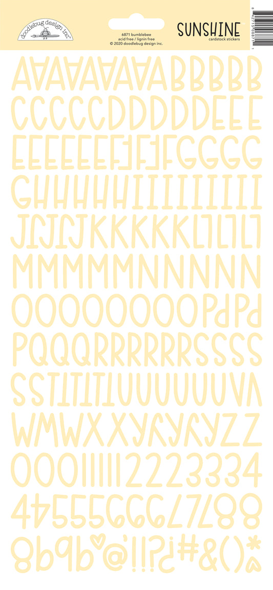 Yellow letter and number stickers on a white background