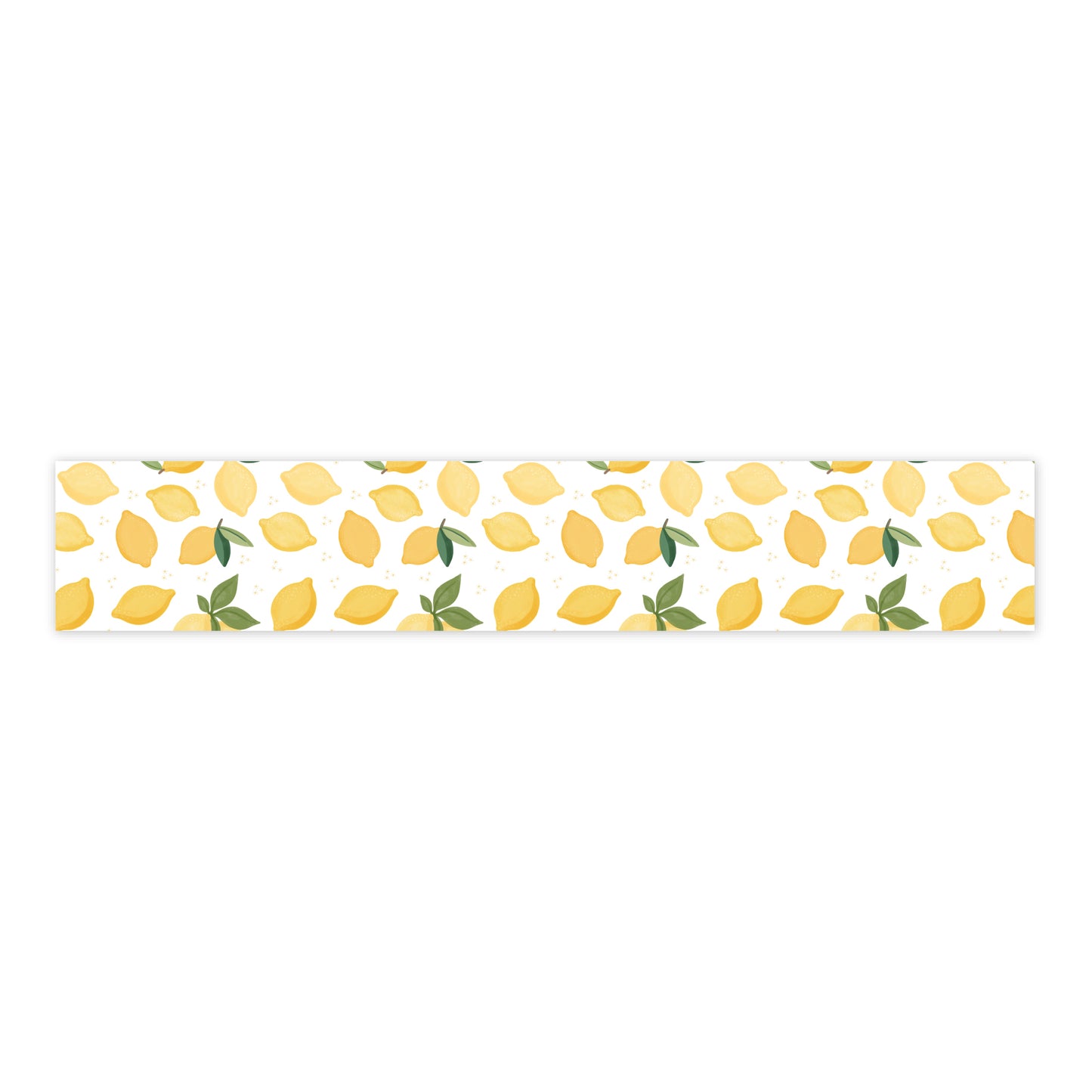 Strip of washi tape with lemon pattern on a white background