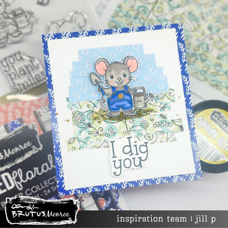 Card with a mouse illustration and 'I dig you' text, surrounded by craft supplies.
