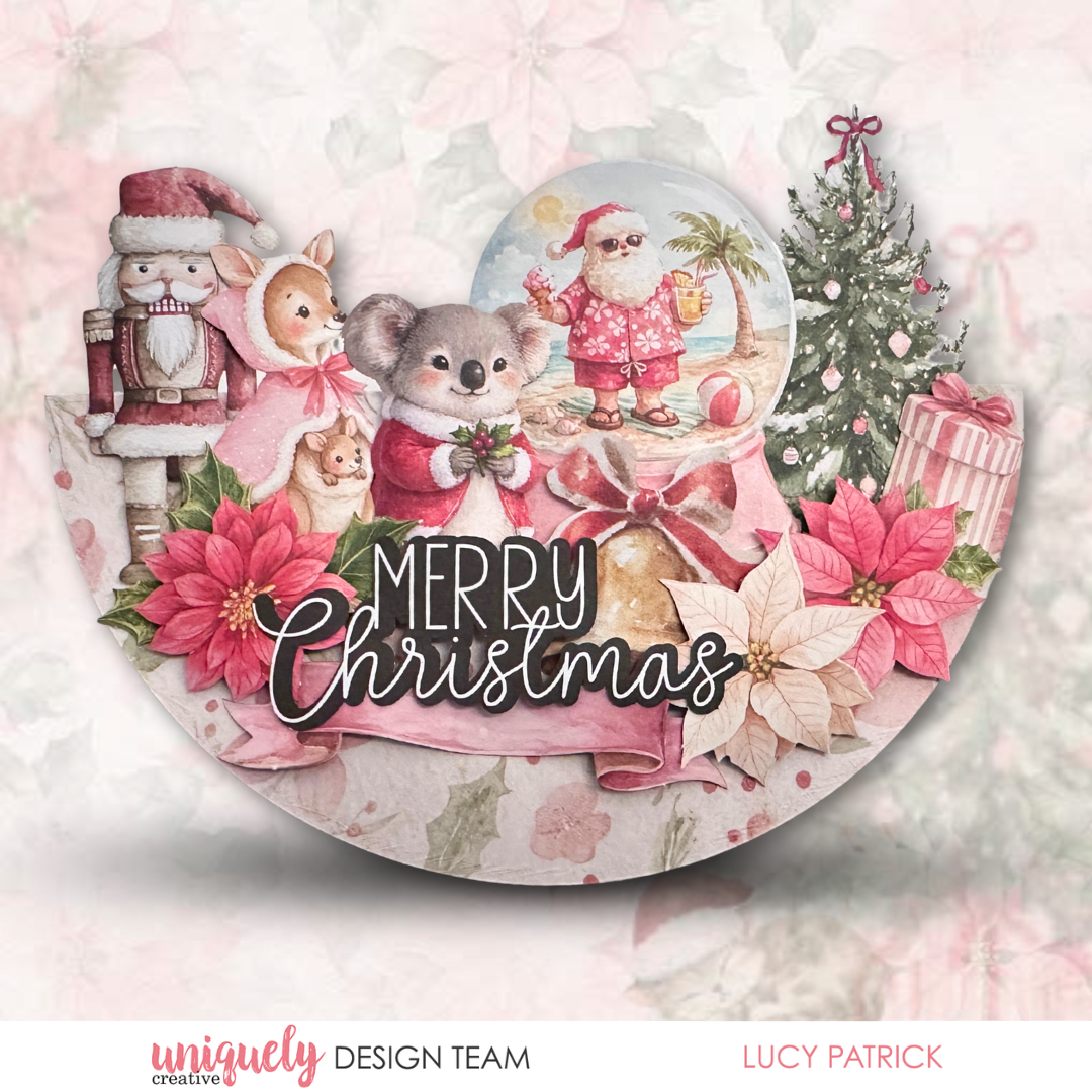 A festive Christmas collage design featuring a nutcracker, deer, koala, Santa in a snow globe, a decorated tree, poinsettias, and the text 'Merry Christmas' on a soft pastel background. The artwork is presented with a branded watermark at the bottom.