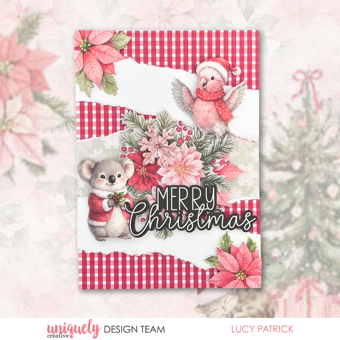 A festive handmade Christmas card featuring a koala and a bird in winter clothing, surrounded by poinsettias and greenery, with the text 'Merry Christmas' on a layered white and red gingham background.