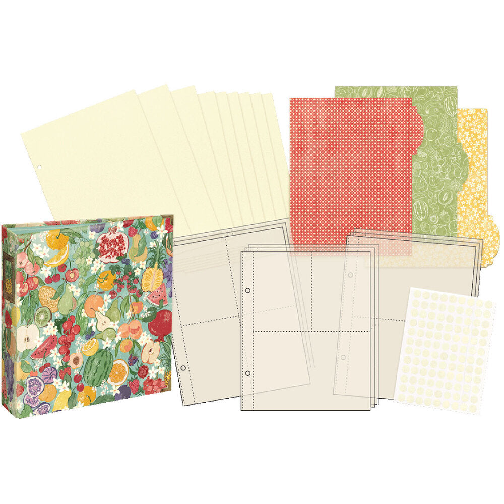Collection of patterned paper sheets, dividers, sheet protecctors, and a fruit and floral scrapbook album on a white background