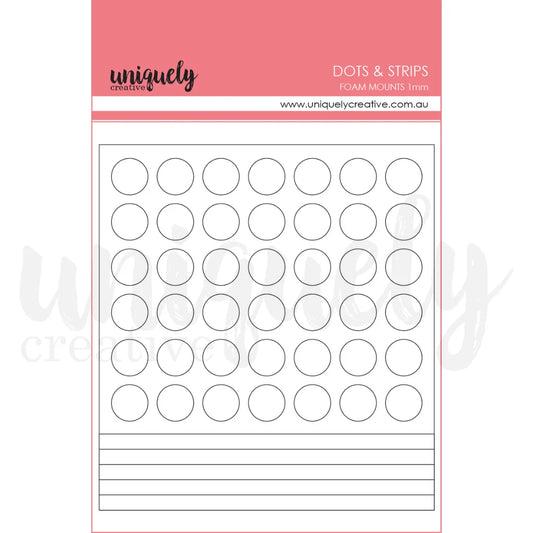 A sheet of uniquely creative foam craft mounts featuring rows of small oval cutouts and lined sections, with a pink header card labeled 'DOTS & STRIPS' and the brand name 'uniquely creative'.