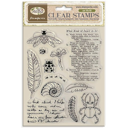 Set of clear stamps with various designs including insects and nature elements on a beige background.